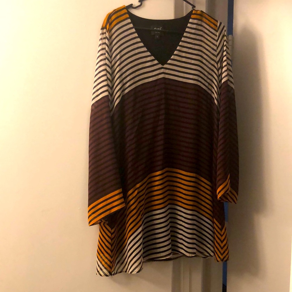 Multi mix colors of white,yellow and maroon,Length up to knees long sleeve